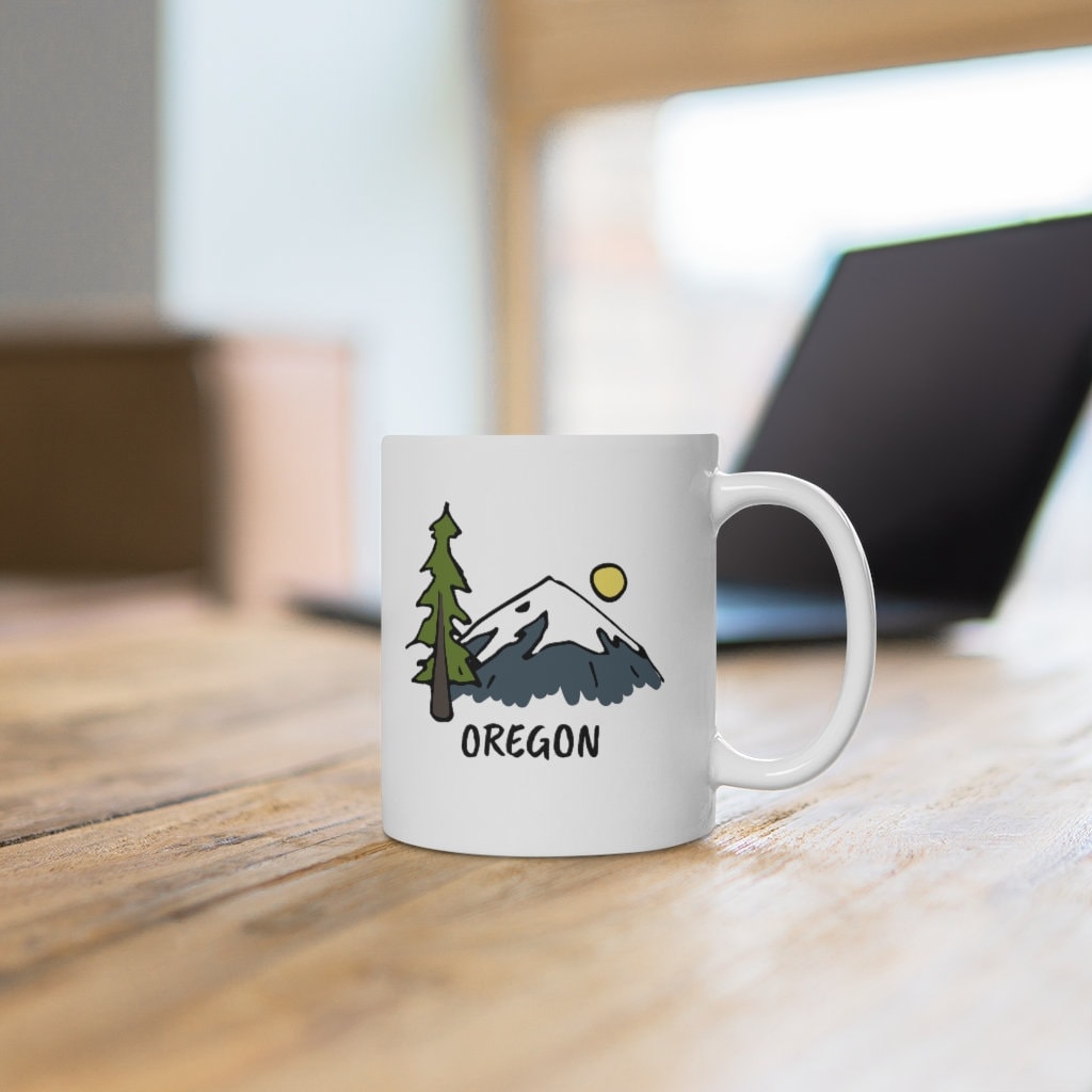 Oregon Mug Ceramic Oregon Mug Personalization Available Graphic Tee – Warm & Stylish · Trending Graphic Apparel