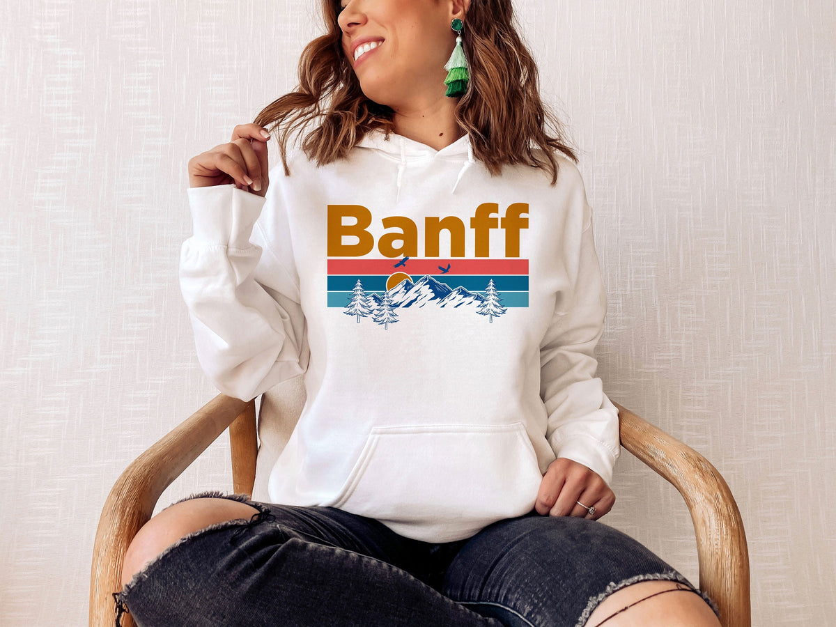 Banff Hoodie Retro Mountain Sun Unisex Banff Hoodie Sweatshirt Personalization Available Hoodie – Fan Favorite · Trending Graphic Apparel