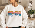 North Carolina Sweatshirt Mountain Sunset Unisex North Carolina Sweatshirt Personalization Available Sweatshirt – Warm & Stylish · Must-Have Style