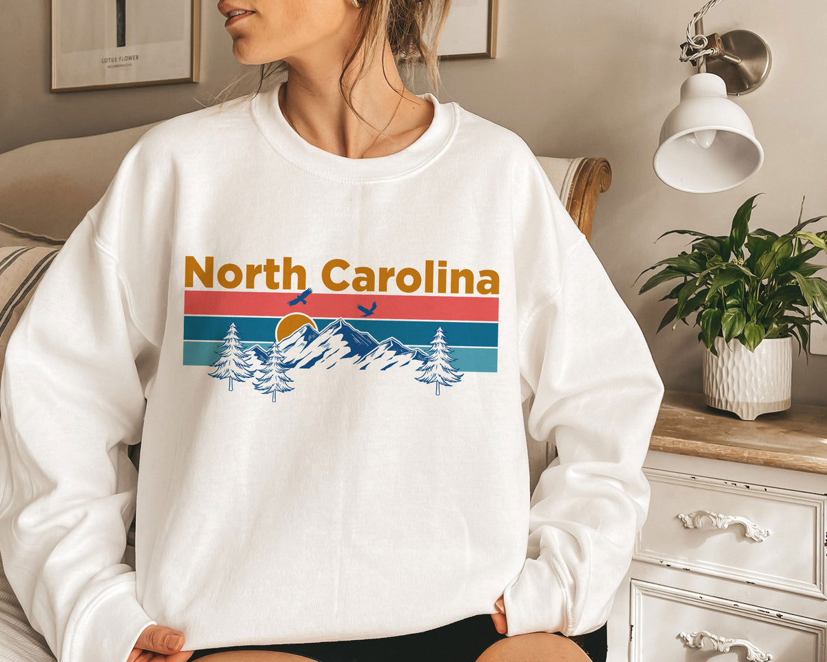 North Carolina Sweatshirt Mountain Sunset Unisex North Carolina Sweatshirt Personalization Available Sweatshirt – Warm & Stylish · Must-Have Style
