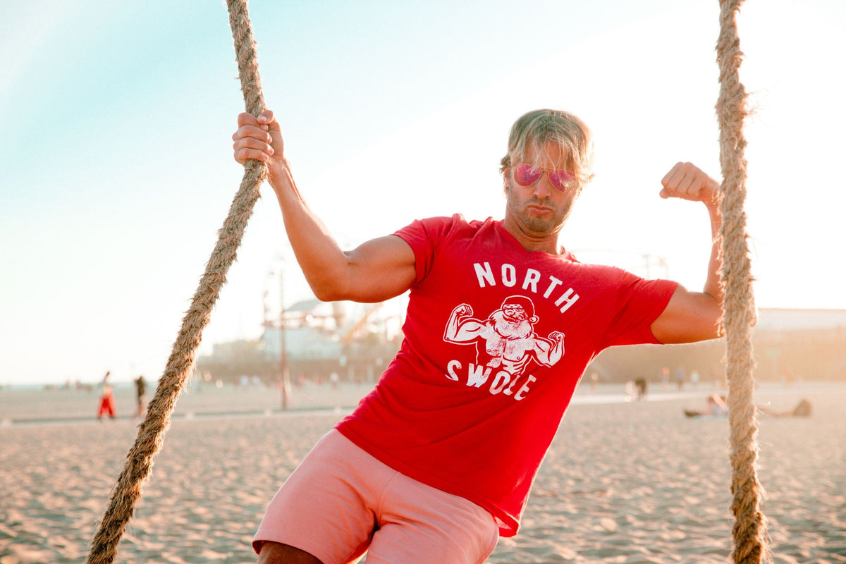 Santa Face Christmas Shirt Christmas Shirt Man Beard Shirts Festive Tee Funny Christmas Shirts North Swole Santa Workout Jacked Santa Graphic Tee – Premium Graphic · Perfect For Daily Wear