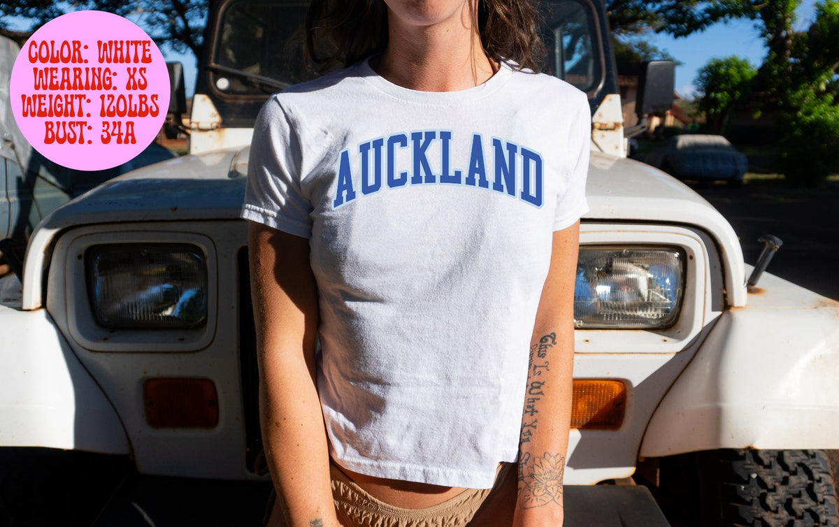 Auckland New Zealand Baby Tee SNUG FIT Gifts Shirt Tshirt Her Women Trendy 90s Y2K Summer Pink Blue White Grey Aesthetic Graphic Tee – Bold Style · Trending Graphic Apparel