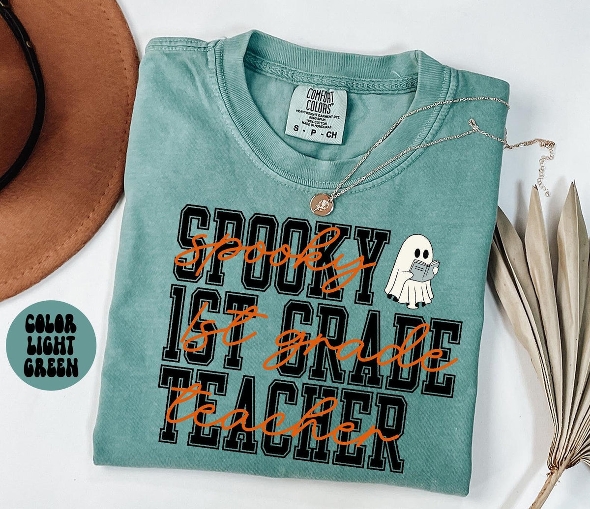 1st Grade Teacher Spooky Halloween Shirt Gifts Comfort Colors Tshirt Crewneck Tee Crew Neck Men Women Graphic Tee – Warm & Stylish · Must-Have Style
