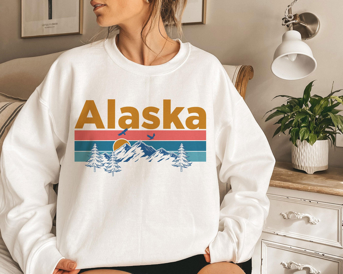 Alaska Sweatshirt Mountain Sunset Unisex Alaska Sweatshirt Personalization Available Sweatshirt – Fan Favorite · Must-Have Style