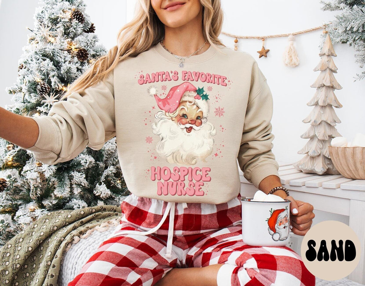 Hospice Nurse Christmas Sweatshirt Hospice Nurse Christmas Gifts Santa Pink Christmas Crewneck Sweater Shirt Women Sweatshirt – Aesthetic Look · Must-Have Style