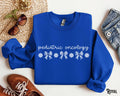 Pediatric Oncology Sweatshirt PEDS ONC Sweater Nurse Doctor Crew Coquette Bow RN Cancer Nurse Crewneck Hematology Nursing Gift Sweatshirt – Cozy Vibes · High-Quality Print