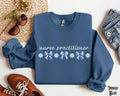 Nurse Practitioner Sweatshirt NP Sweater Blue Coquette Bow Flowers Floral Women39s NP Crewneck Girly Emergency ICU Nursing Gift Sweatshirt – Soft Feel · Great Gift For Fans