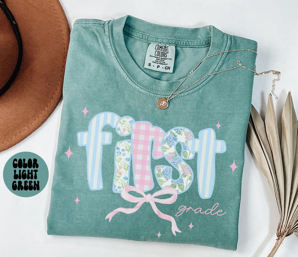 First Grade Comfort Colors Shirt Teacher Team TShirts 1st Grade Tee Back to School First Grade Department Gifts Crew Graphic Tee – Easygoing Wear · High-Quality Print